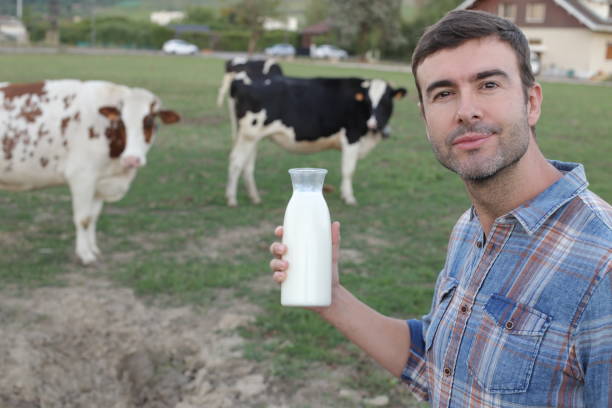 istock Farmer holding fresh bottle of milk 1417888943