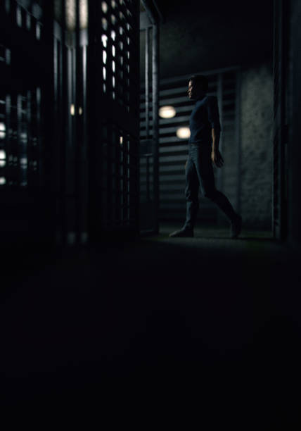 istock Prisoner walks towards his cell in dark cell block. 3D render. 1417890673