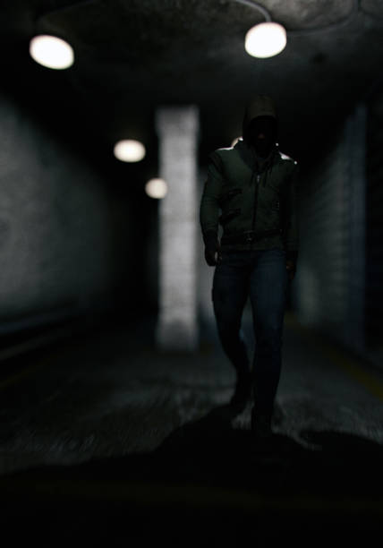 istock Man in hoodie walks in dark prison. 3D render. 1417890682