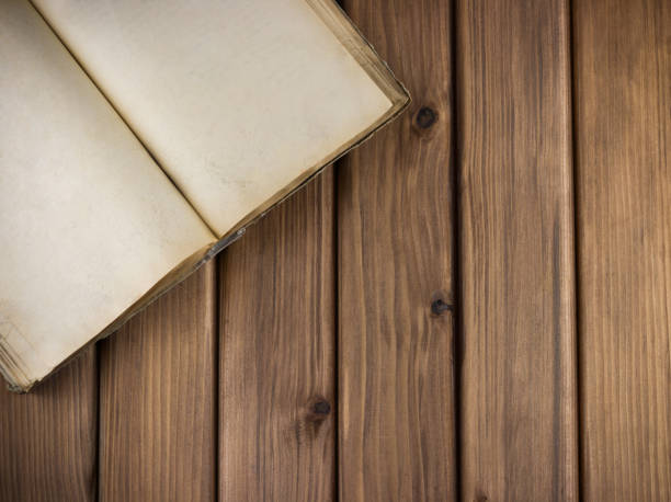 istock Blank old book on wooden 1417891234