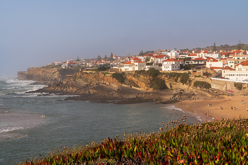 Praia das Macas overlooking the city on a sunny day. Portugal
