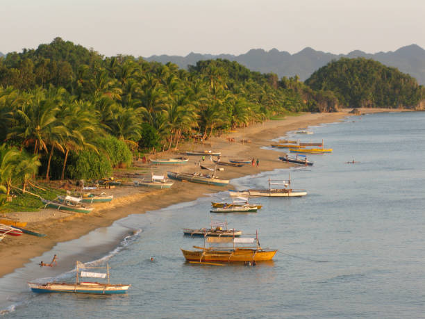 istock Elevated view of boats moored at beach 1417895346