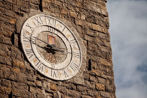 Picture of a close up on the clock of Piran, Slovenia, on the saint george church. St. George's Parish Church in Piran, or upnijska cerkev sv. Jurija v Piranu is a Roman Catholic church located on the hill above Piran, a port town on the coast of the Adriatic Sea in southwestern Slovenia. It was built in the Venetian Renaissance architectural style and has been dedicated to Saint George.
