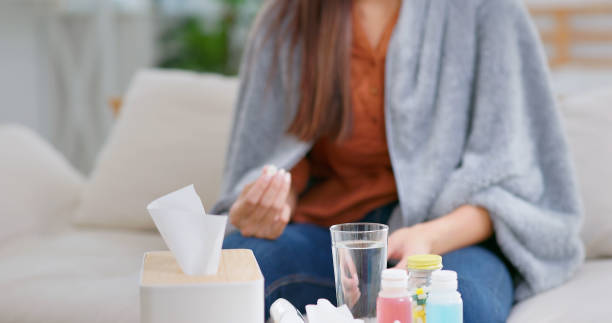 istock woman taking medicine 1417897857