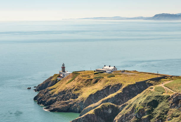 Baily Lighthouse on Howth headland in County Dublin stock photo