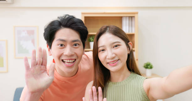 istock asian couple have video chat 1417900347