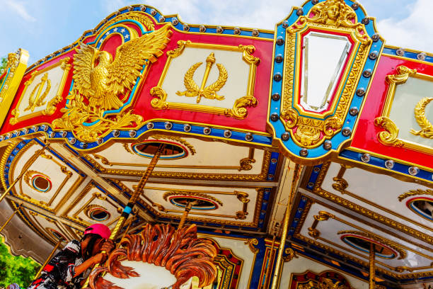Carousel at night with blurred lighting.  Background concept - Abstract concept for winter fun