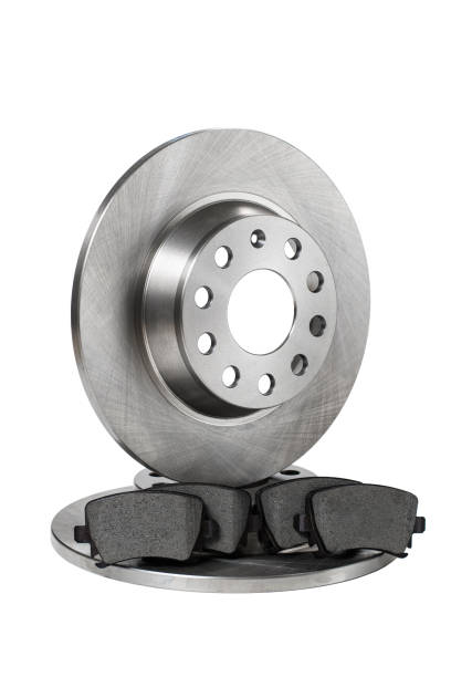 istock New set of brake discs and brake pads on a white background. Vertical format, isolated object. 1417904432