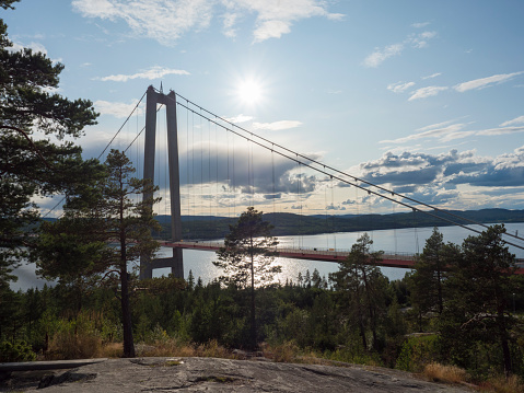 Summer view of the High coast bridge Hogakustenbron seen from the north bank of the river Angermanalven located near Harnosand in Vaesternorrland, Sweden