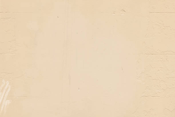 istock Part of a textured beige concrete wall 1417908695