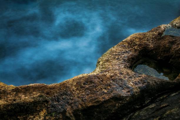 Free picture: Close-up of big rocks on wet ground with dark blue night sky