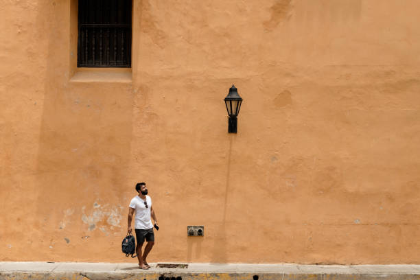 istock Man standing on the sidewalk 1417912717