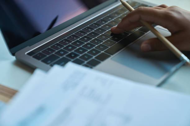 istock Process of typing on a laptop keyboard at the workplace 1417915515