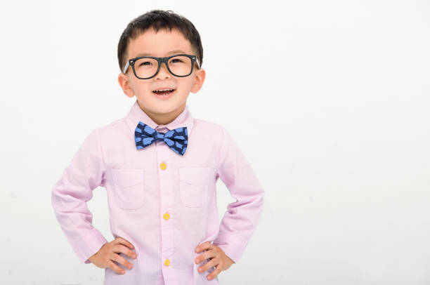 istock Happy Boy in a suit  isolated on white background 1417916973