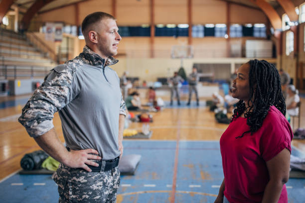 istock Woman talking to a soldier 1417919007