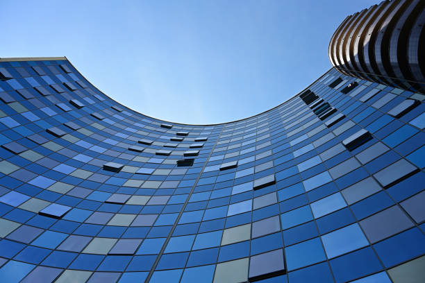 istock Office building on a blue sky background 1417919817