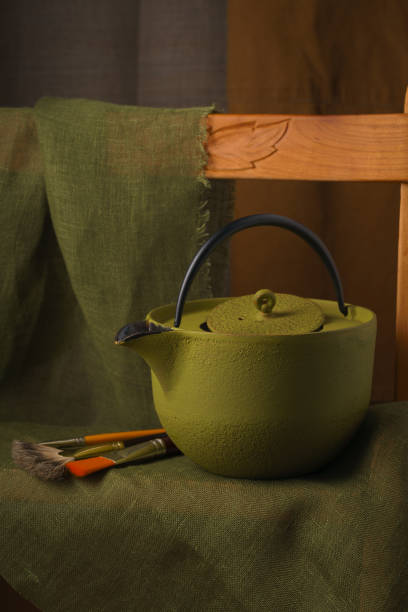 Still life with green teapot stock photo