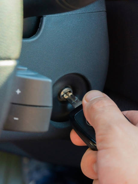 istock starting the engine with a key in the car 1417920941