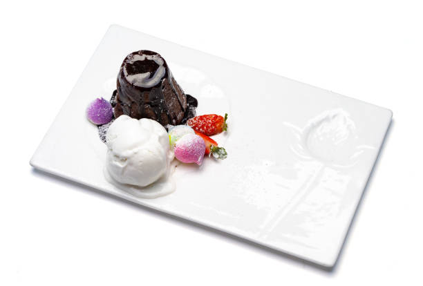 istock Chocolate fondant with ice cream, chocolate dish, chocolate cupcake with cream 1417921093