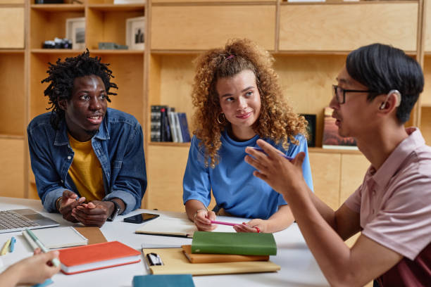 istock Group of Young People Studying Together 1417921770