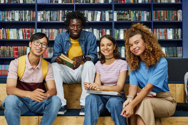 istock Portrait of Diverse Students in Library 1417921890
