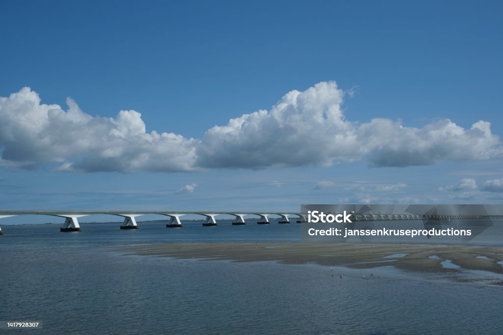 View on longest bridge in the Netherlands, Zealand bridge spans Eastern Scheldt estuary, connects islands Schouwen-Duiveland and Noord-Beveland in province of Zeeland, water of Oesterschelde and boats Accidents and Disasters Stock Photo