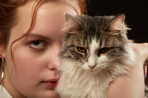 istock woman with cat 1417928727