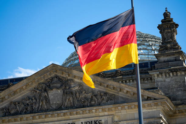 istock Reichstag building with German flag, Deutscher Bundestag. 1417928883