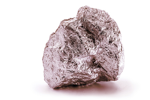 Galena rock specimen. The raw mineral lead sulphide with a distinct weight and shiny metalic colour in a white matrix of fluorite. The most important ore of lead and a source of silver.