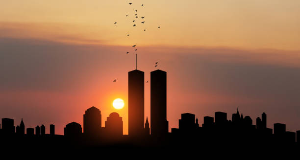New York skyline silhouette with Twin Towers and birds flying up like souls at sunset. American Patriot Day banner. New York skyline silhouette with Twin Towers and birds flying up like souls at sunset. 09.11.2001 American Patriot Day banner. NYC World Trade Center. twin towers manhattan stock pictures, royalty-free photos & images