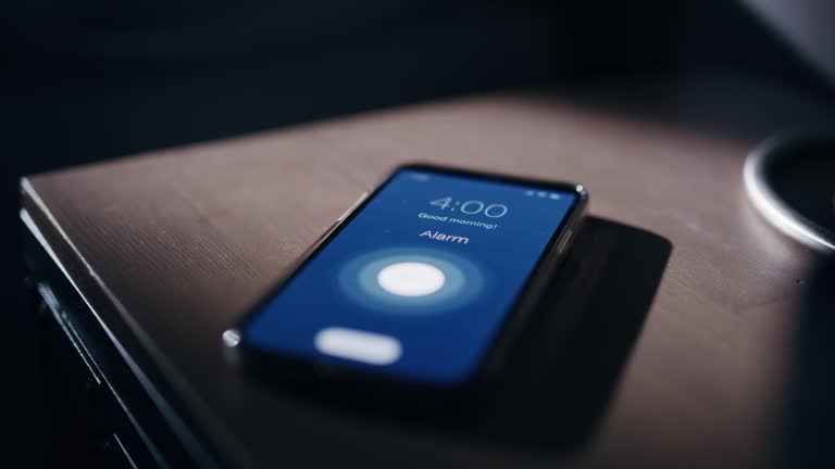 Smartphone Alarm Clock App Rings for Wake up, Screen Shows