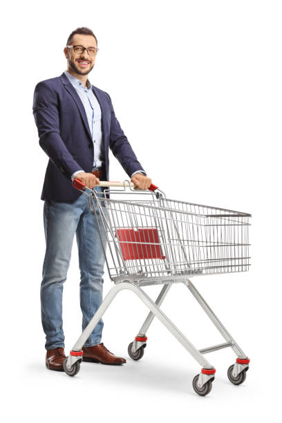 istock Young man standing with an empty shopping cart 1417940913