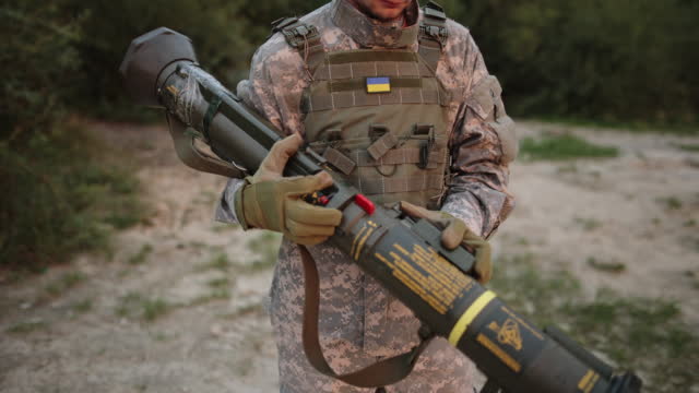 The Army soldier holding an anti-tank weapon