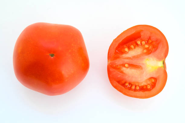 istock tomato close-up on a white background 1417945853