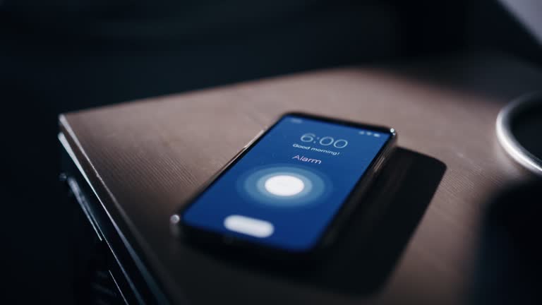 Smartphone Alarm Clock App Rings for Wake up, Screen Shows