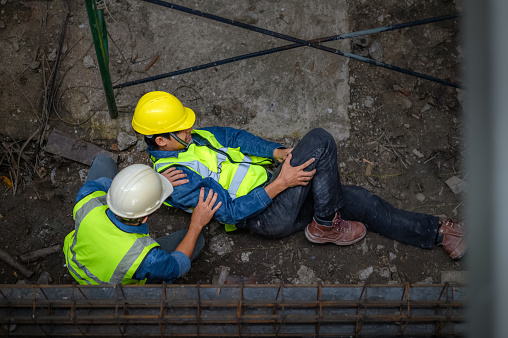 Fall In Building A Young Asian Builder Falls From A Scaffold At A Construction Site An ...