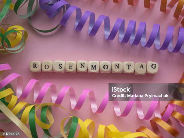 Rosenmontag In Wooden Cubes On Pink Background Stock Photo - Download Image Now - Carnival - Celebration Event, Streamer, Arts Culture and Entertainment