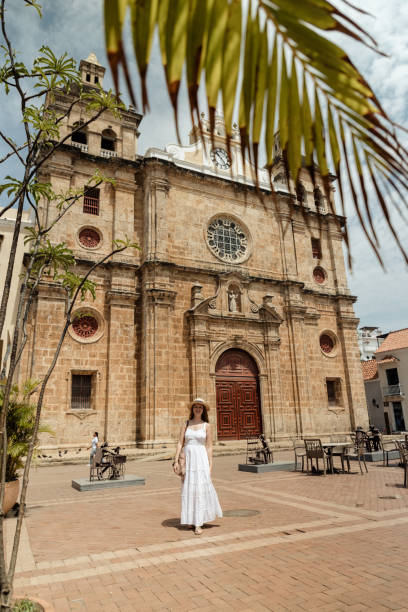 istock Girl walking in a square 1417950168