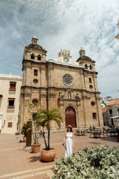 istock Girl walking in a square 1417950169