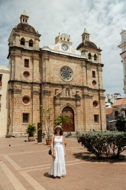 istock Girl walking in a square 1417950185