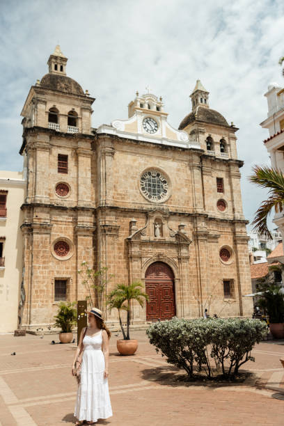 istock Girl walking in a square 1417950190
