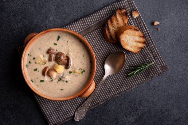 istock Creamy porcini mushroom soup in a rustic bowl 1417950320