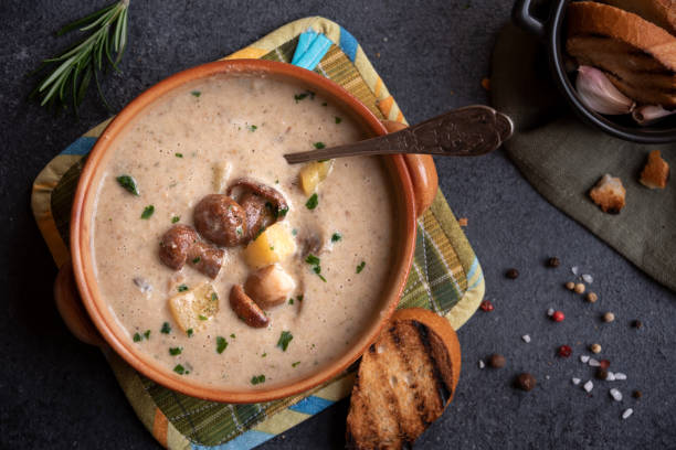 istock Creamy porcini mushroom soup in a rustic bowl 1417954001