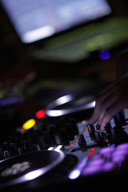 istock Control DJ for mixing music with blurred 1417954585