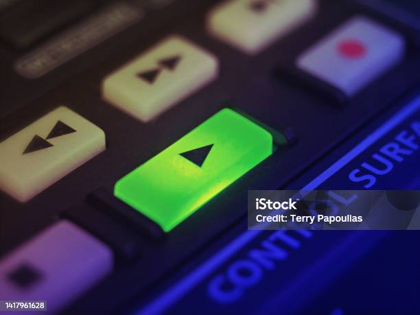 Highlighted Play Button Of A Professional Music Controller Used On Entertainment Industry Video Or Audio Stock Photo - Download Image Now