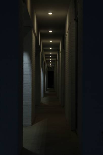 istock Vertical shot of a dark hallway 1417962271