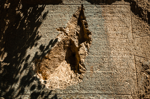 The wall on which Epictetus' A Poem on the Free Man is written. The poetry on the temples, temples and rock inscriptions belonging to the Byzantine period.Smashed, broken, destroyed, historical artifact rock inscription.Written Canyon region.The canyon takes its name from an ancient text carved into a rock inside.