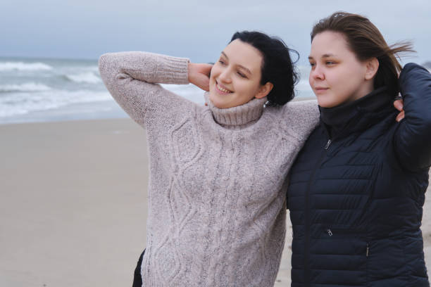 istock women near sea 1417976729