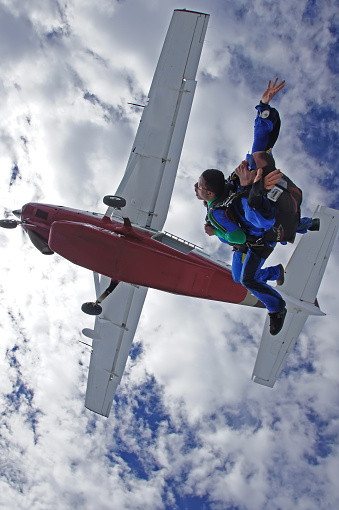 September 10, 2011. São Paulo, Brazil. A tourist jumps with the instructor from an airplane.