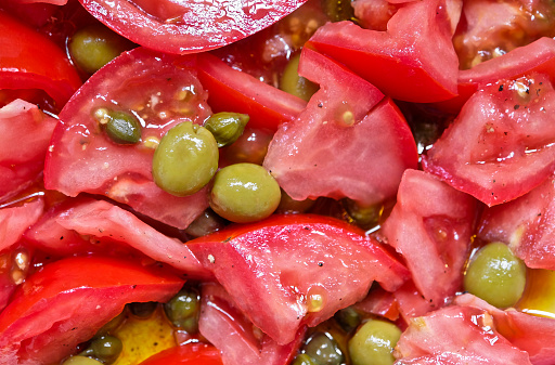 Mediterranean salad with tomatoes, olives and capers.
